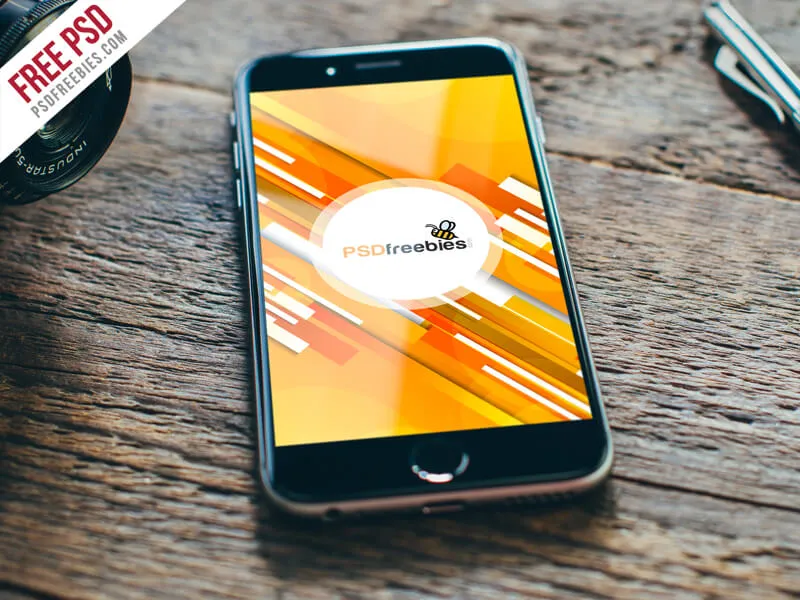 Apple iPhone on Wooden Table Mockup PSD