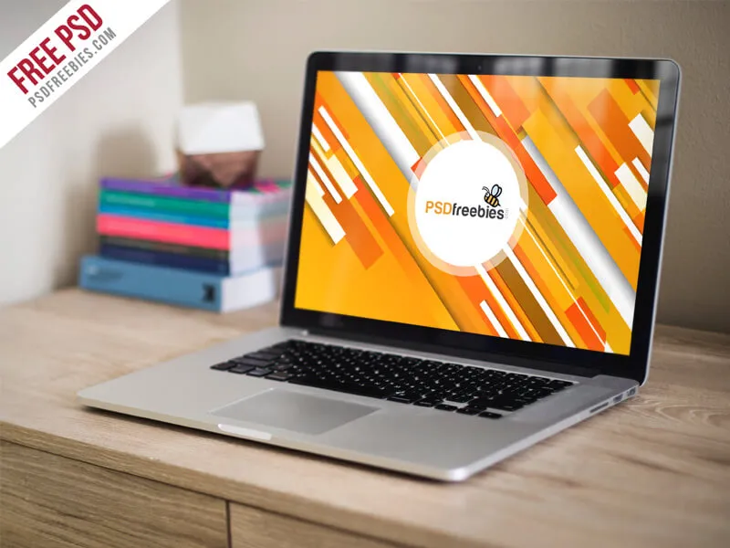 Macbook Pro on Wooden Table Mockup PSD